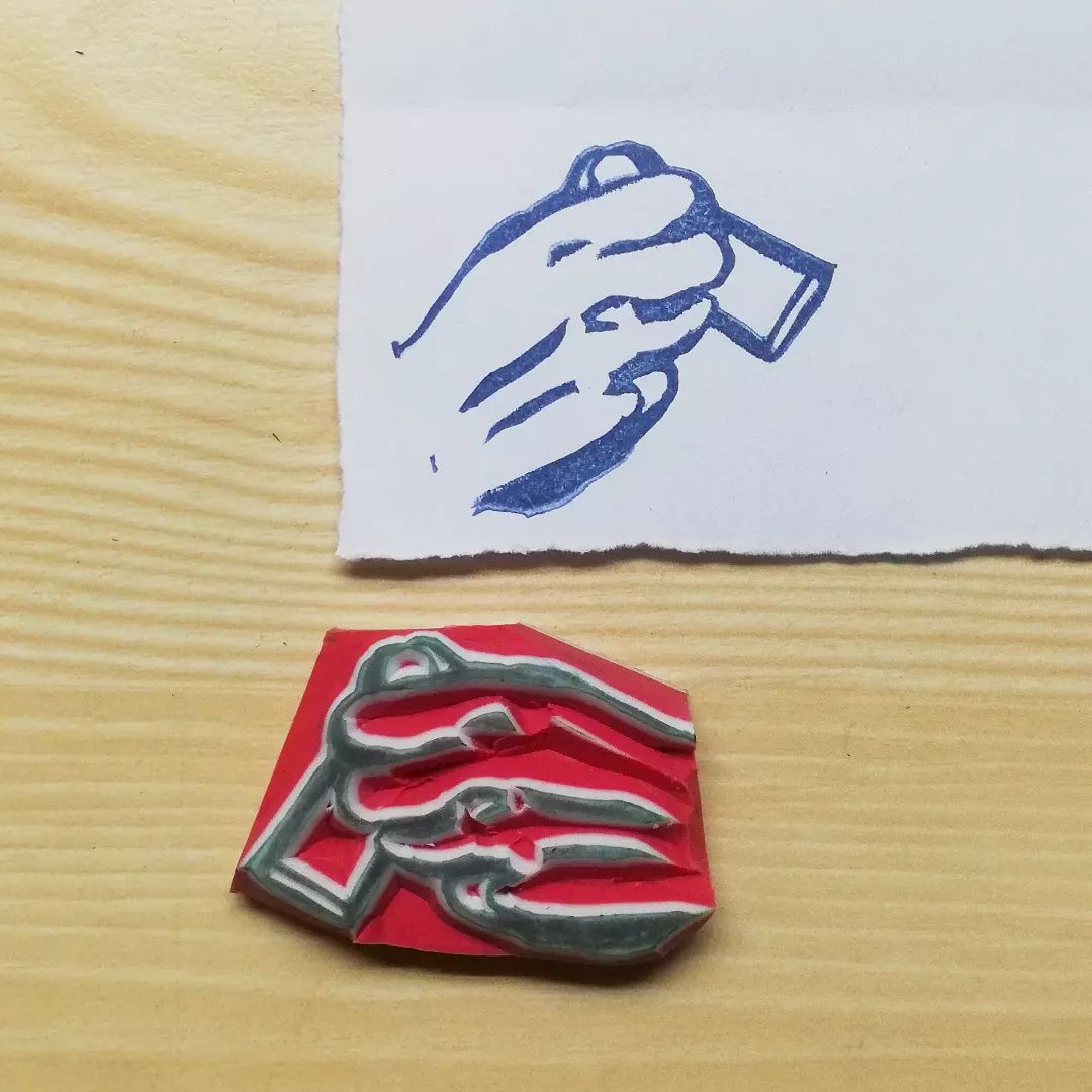 Hand on stamp